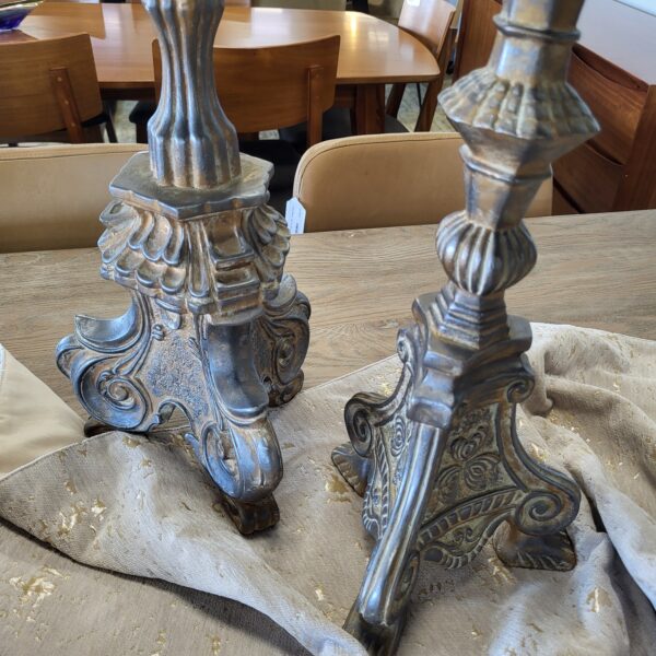 pair of very heavy ornate candle holders