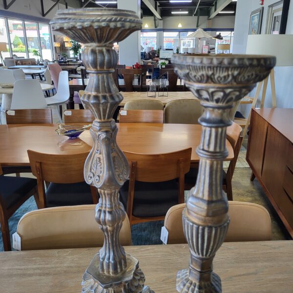 pair of very heavy ornate candle holders