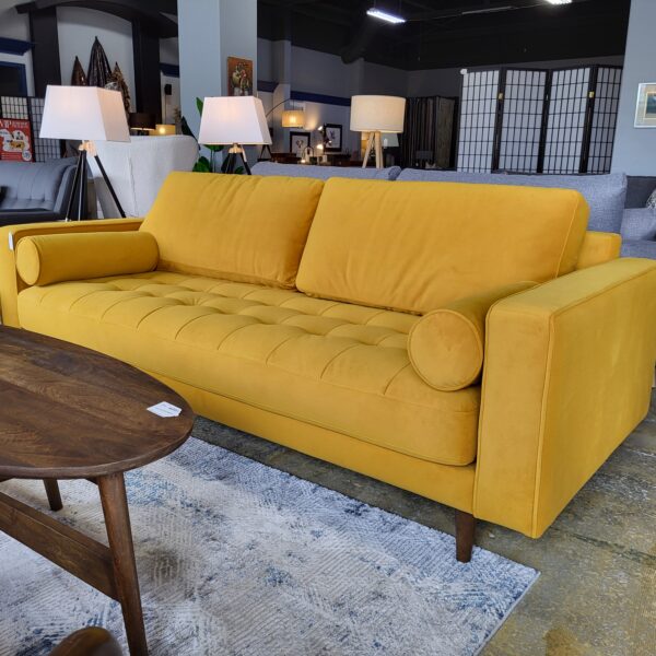 golden velvet tufted sofa