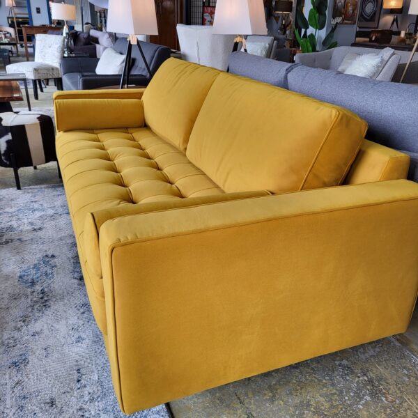 golden velvet tufted sofa