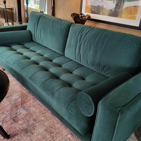 forest green velvet tufted sofa