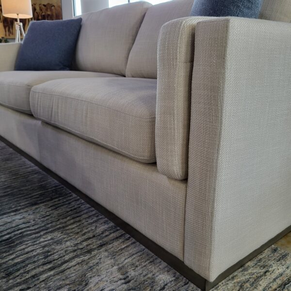 cream sofa w/ grey mono base