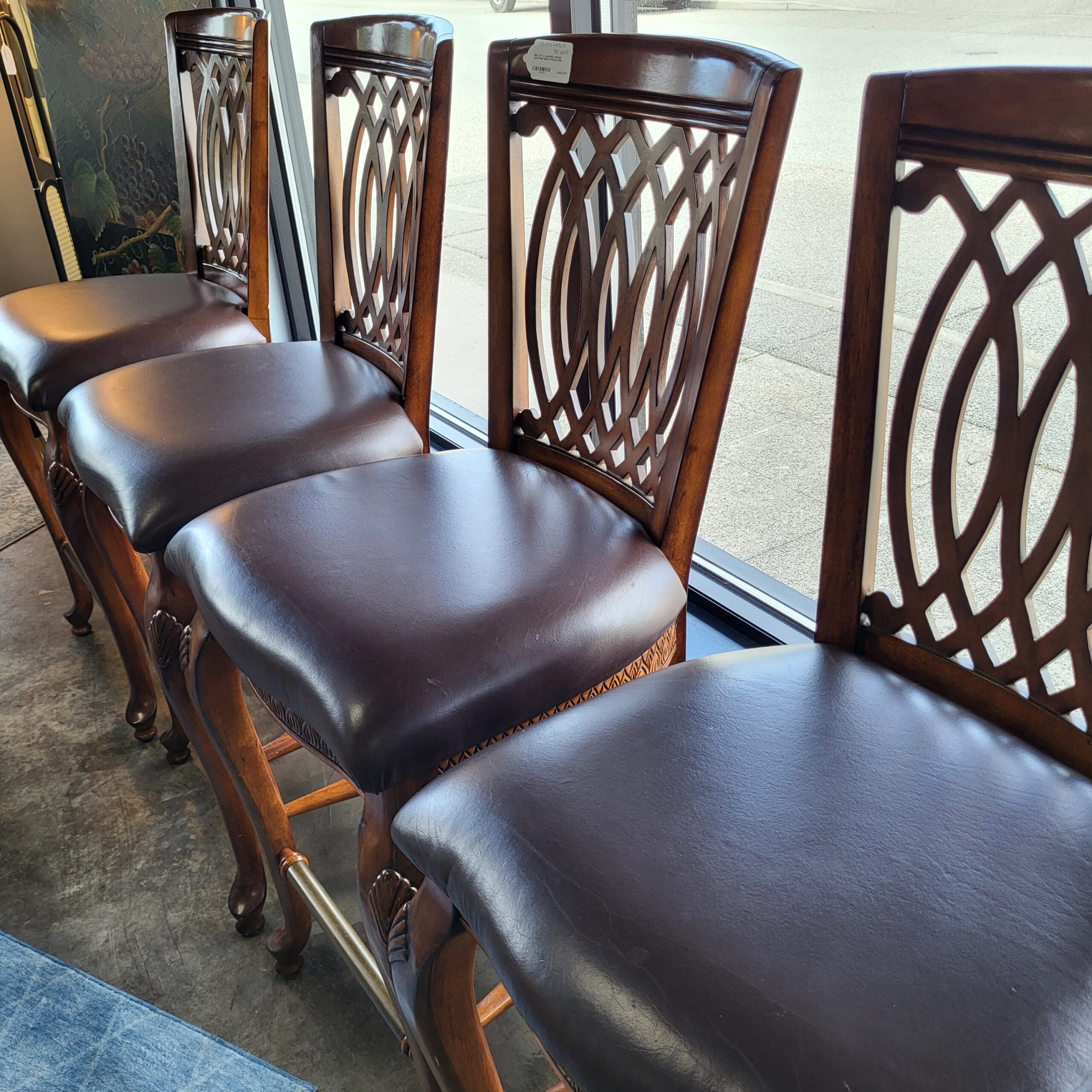 set of 4 carved woon faux leather barstools