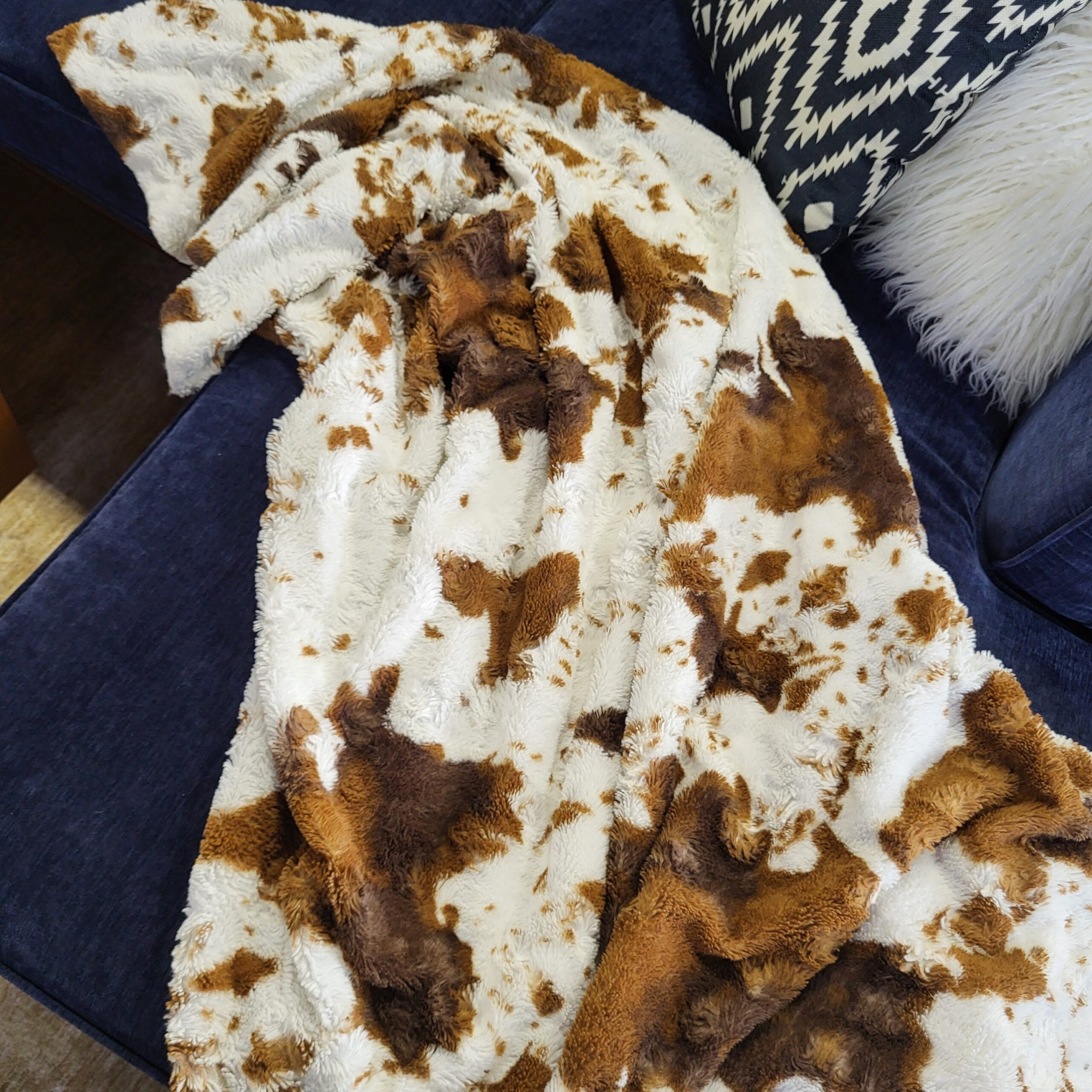 cow faux fur blanket