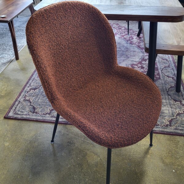 rust boucle chair