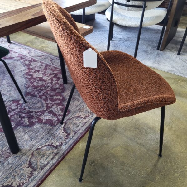 rust boucle chair