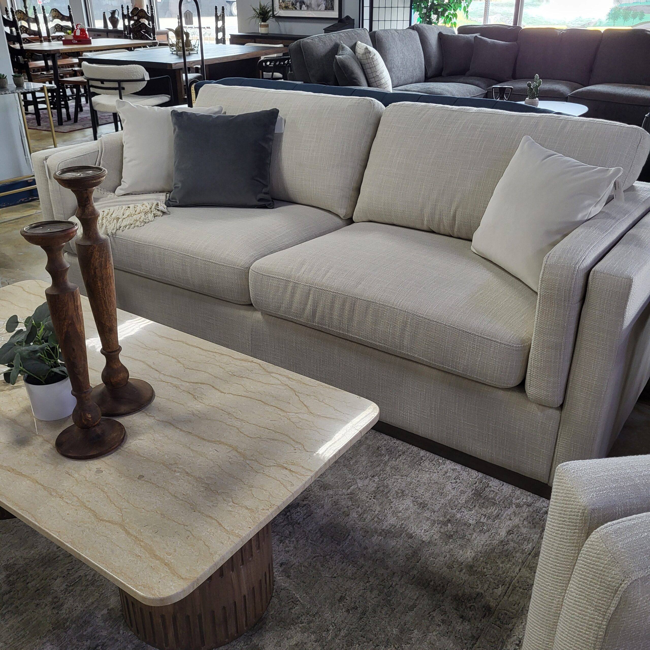 cream sofa w/ grey mono base