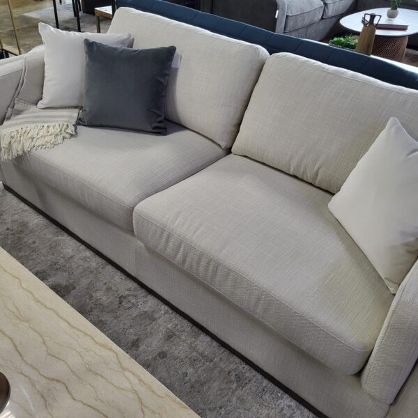 cream sofa w/ grey mono base