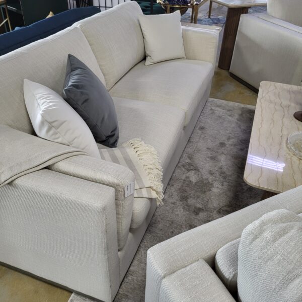 cream sofa w/ grey mono base