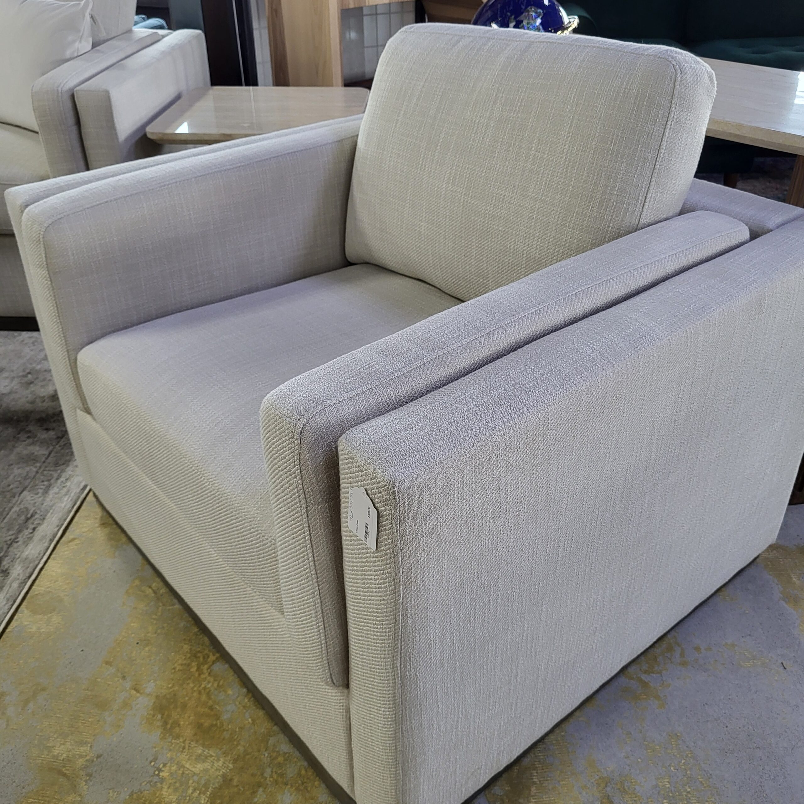 cream sofa w/ grey mono base