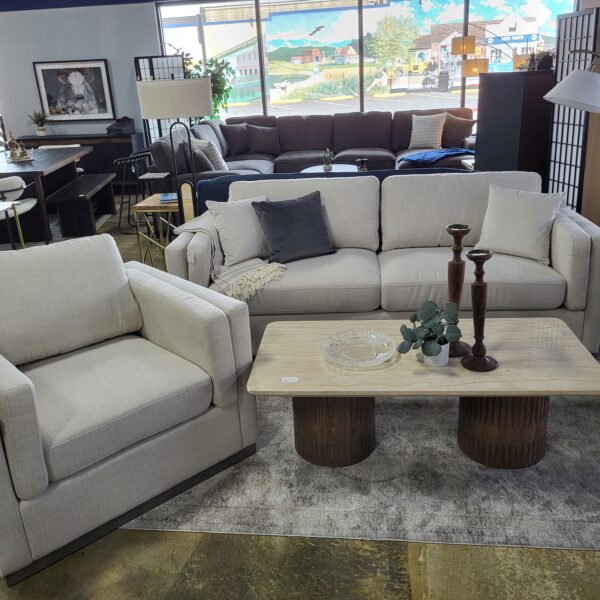 cream sofa w/ grey mono base