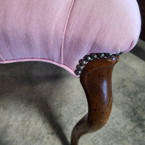 pink tufted shield back chair