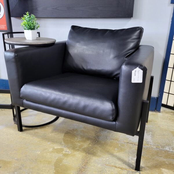 black faux leather accent chair