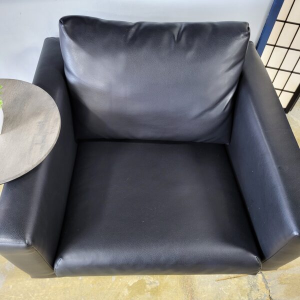 black faux leather accent chair