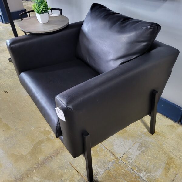 black faux leather accent chair